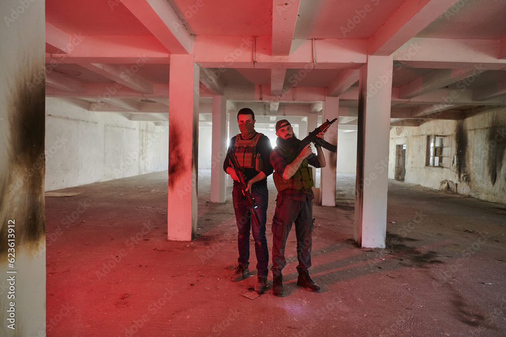 An abandoned building serves as the stronghold for a team of terrorists, fiercely guarding their occupied territory with guns and military equipment