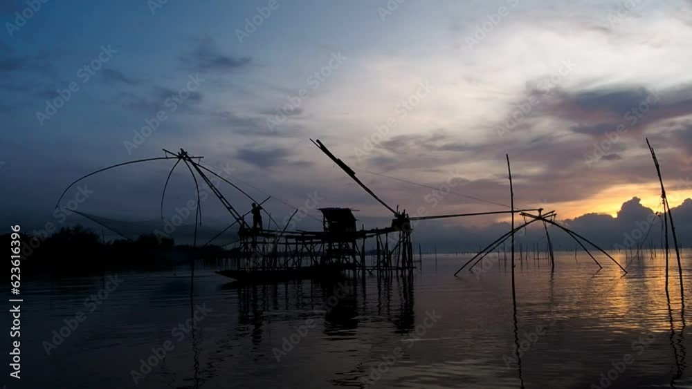 Phatthalung Thailand, Landscape front view atmosphere of cruising on the lake in the morning day dawn and sunset golden light, with the fishing local fisherman mornings. Phatthalung Thailand, Landscape front view atmosphere of cruising on the lake in the morning day dawn and sunset golden light, with the fishing local fisherman mornings.