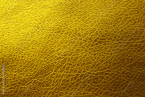 Golden textured surface as background  closeup view