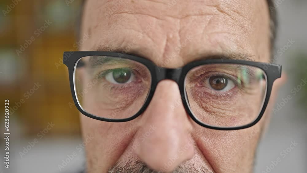 Middle age man wearing glasses smiling at home Middle age man wearing glasses smiling at home