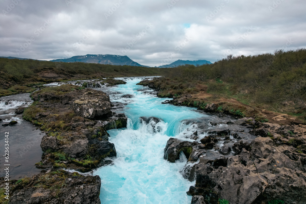 Aerial view of Midfoss Waterfall and landscape in Iceland