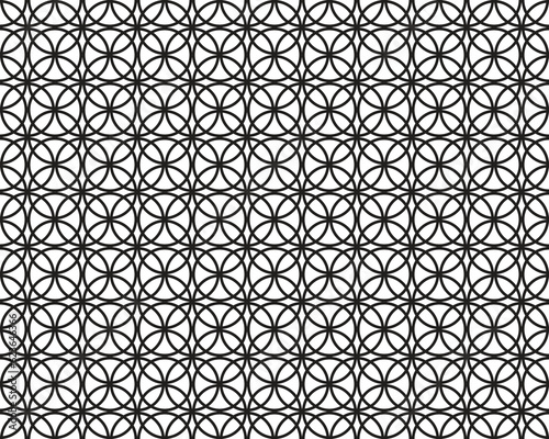 Seamless pattern with black circles on a white background 