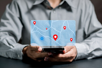 Businessman searching for location on map and pin on virtual screen. GPS app, Destination travel maps and find places in the online system