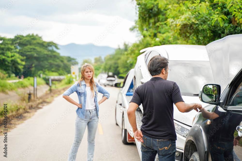 Drivers stood arguing after the car crashed on country road. Drivers stood arguing after the car crashed on country road.