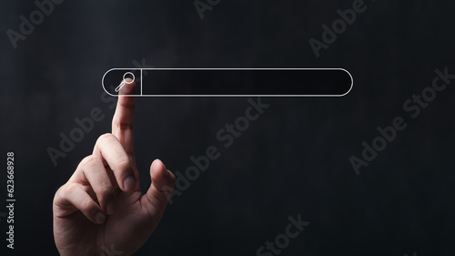 Fotografia man's hands are finger point to Searching for information