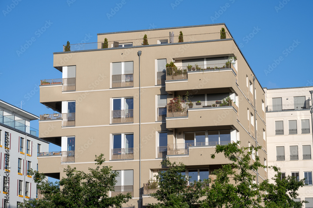 Modern beige apartment building seen in Berlin, Germany
