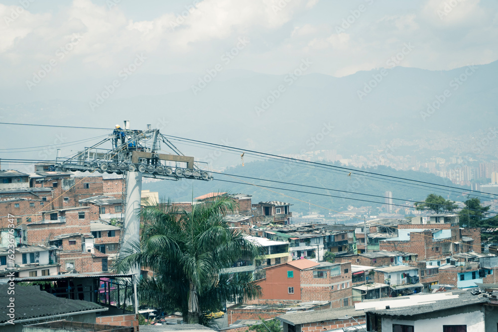 Obraz premium Medellin, Antioquia-Colombia. June 1, 2022. People working on the Medellin metrocable 