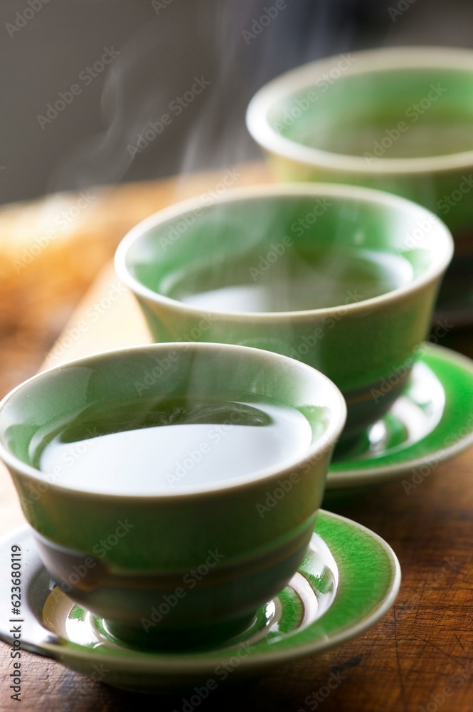 Serenity in Motion: Close-Up of Pouring Green Tea into a Cup, Captured in Exquisite 4K Resolution Serenity in Motion: Close-Up of Pouring Green Tea into a Cup, Captured in Exquisite 4K Resolution