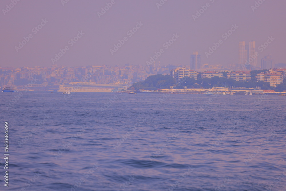 Panorama silhouette Istanbul city buildings from water Bosphorus, a public place	
