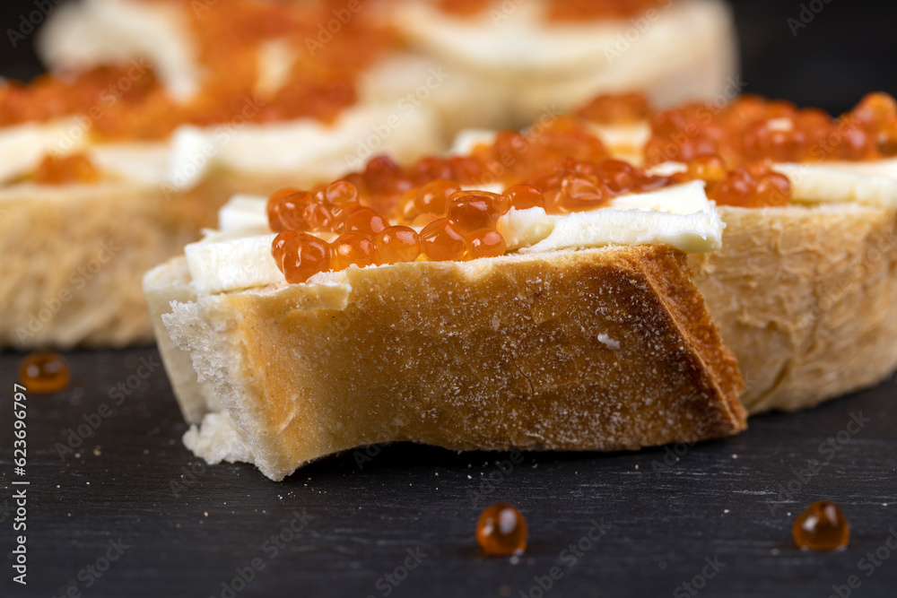 red salmon caviar with white bread and butter red salmon caviar with white bread and butter