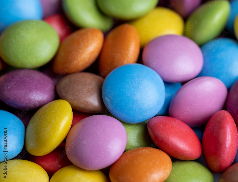 Multicolored chocolates with chocolate filling Multicolored chocolates with chocolate filling
