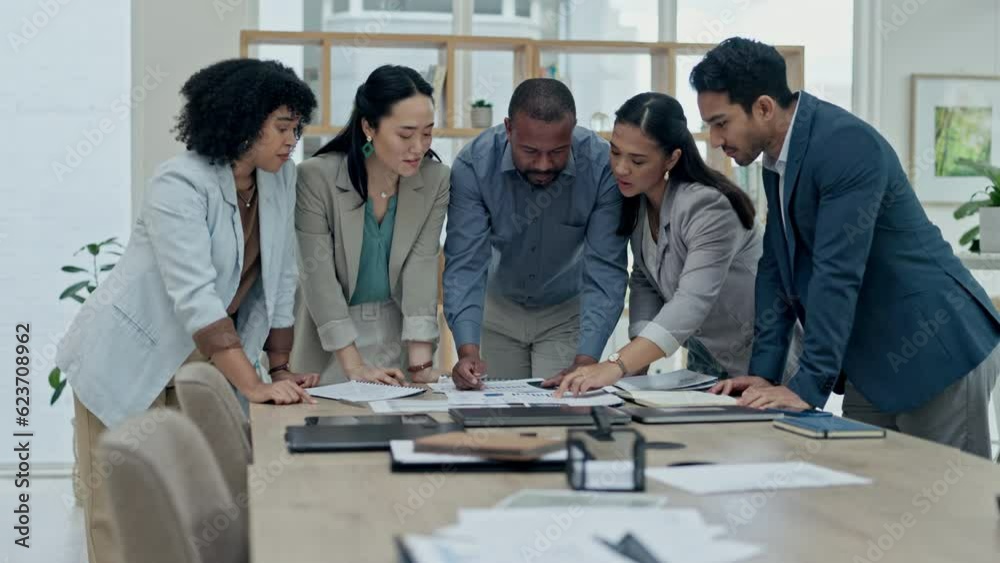 Business people, diversity and meeting for team strategy, planning or collaboration on office desk. Diverse group in teamwork discussion with documents for project plan or sharing ideas at workplace Business people, diversity and meeting for team strategy, planning or collaboration on office desk. Diverse group in teamwork discussion with documents for project plan or sharing ideas at workplace