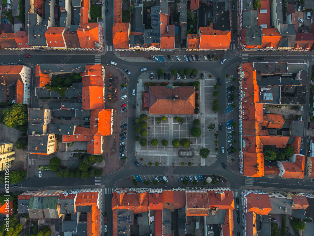 Aerial summer evening view directly above the old town market square in Pleszew, Wielkopolska, Poland