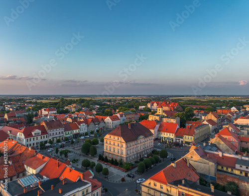 Obraz na płótnie Aerial summer evening cityscape of the old town market square in Pleszew, Wielkopolska, Poland w salonie