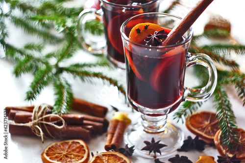 Christmas mulled wine with cinnamon sticks, orange and anise
