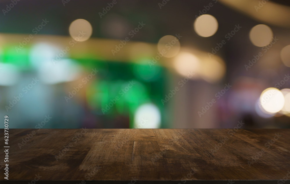 Empty wood table top and blur of out door garden background Empty wooden table space for text marketing promotion. blank wood table copy space for background