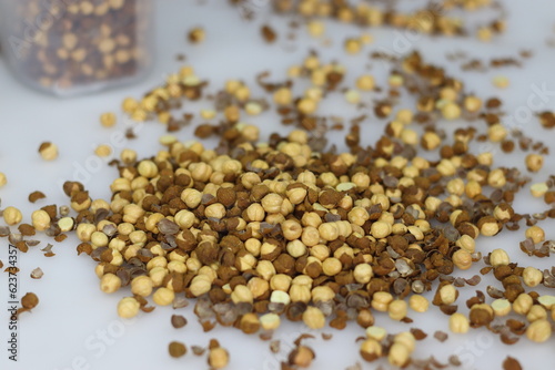 Fotografija Dry roasted chana or whole black grams or chickpeas are typically eaten as a sna