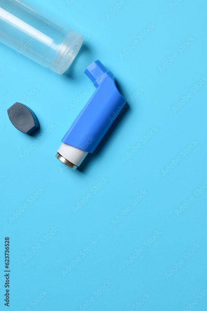 Inhaler and expanding tube for respiratory problems and diseases. Vertical shot and copy space, zenith view. Inhaler and expanding tube for respiratory problems and diseases. Vertical shot and copy space, zenith view.