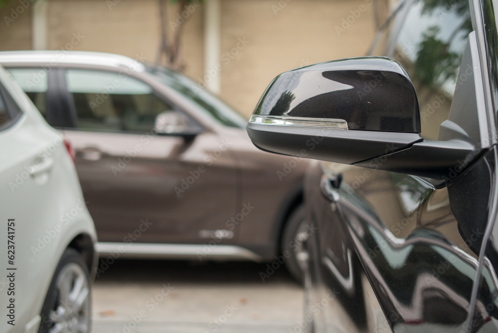 Closeup luxury car side mirror