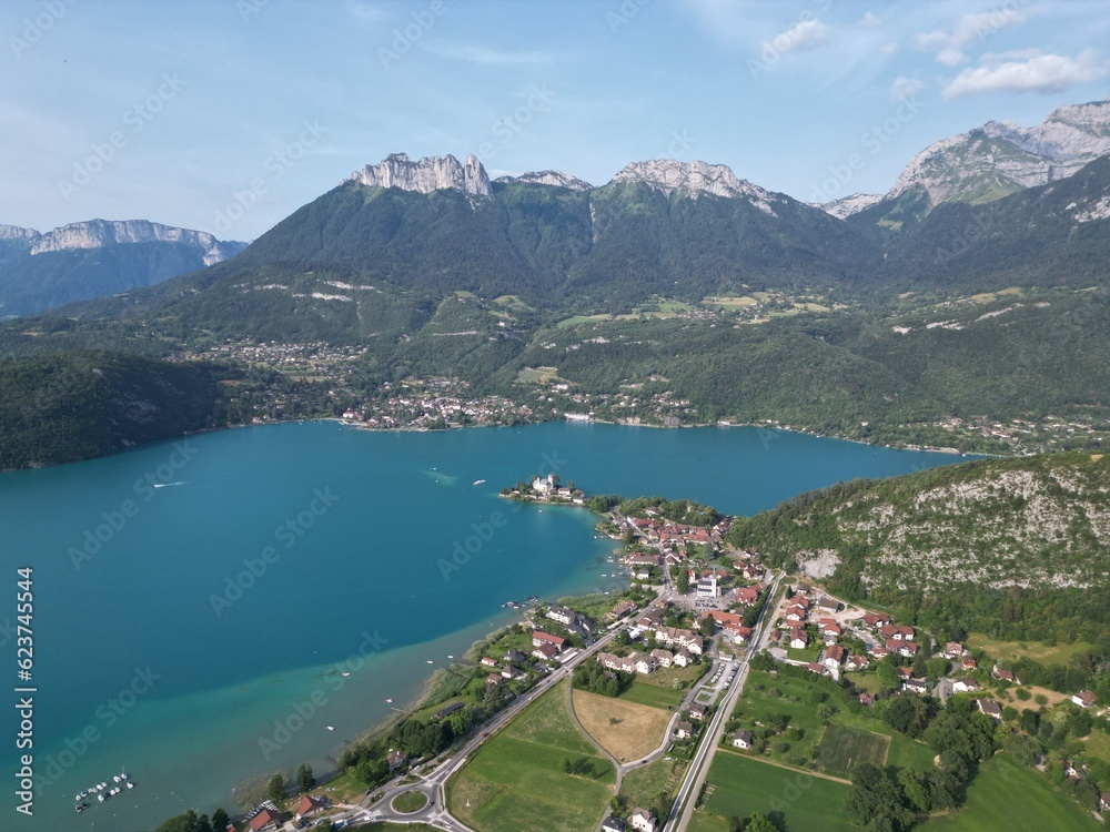 Obraz premium Lake Annecy France high angle aerial drone blue skys sunny day.