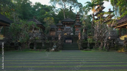 Pura Gunung Lebah, Gunung Lebah Temple is an Ancient temple in scenic jungle surrounds with ornate carvings colorful statues located in Ubud, Bali photo