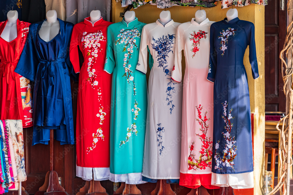 Ao Dai - Vietnamese national garments, lined up in front of the shop.
