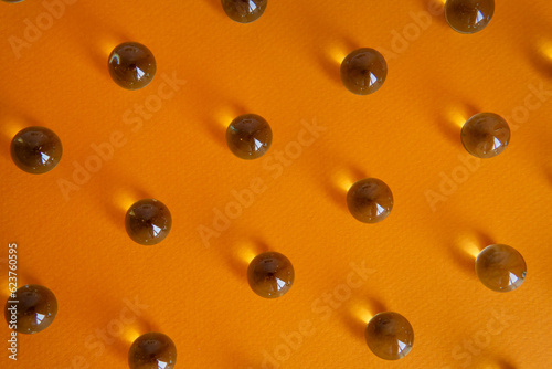 abstract background with transparent balls on orange background