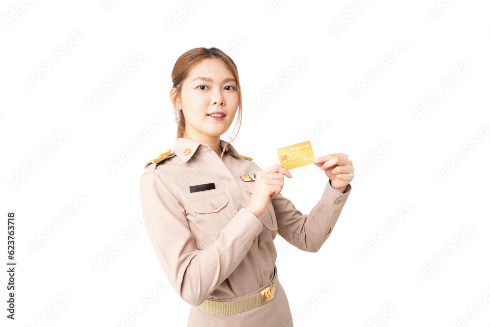 Female Thai government officer in khaki uniforms smiling on isolated white background. Asian woman holding credit cards for transaction money. Concept of advertising, payment purchase, financial. Female Thai government officer in khaki uniforms smiling on isolated white background. Asian woman holding credit cards for transaction money. Concept of advertising, payment purchase, financial.
