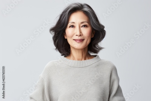 Portrait of a beautiful asian woman smiling and looking at camera