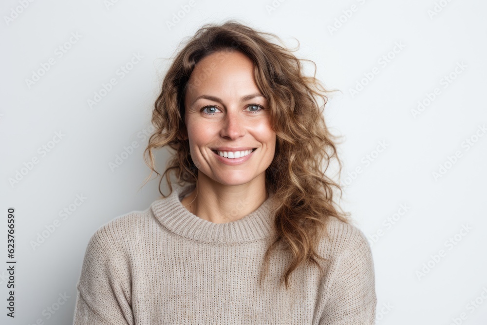 Portrait of a happy young woman with wavy hair on white background Portrait of a happy young woman with wavy hair on white background