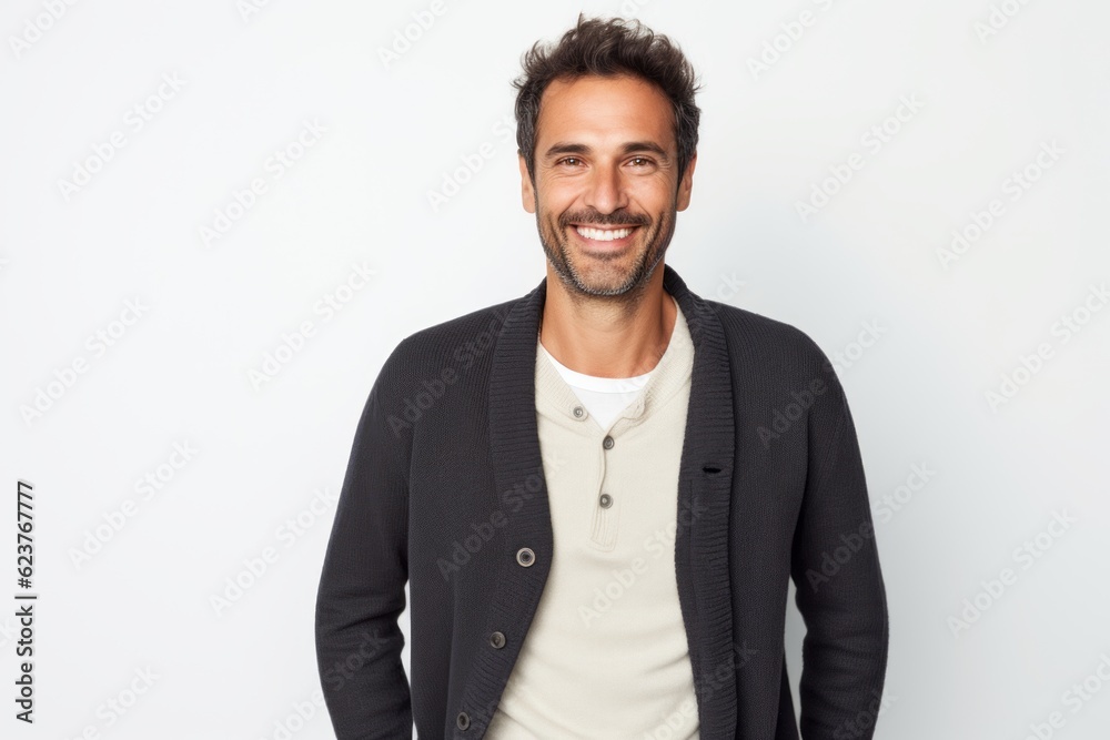 Portrait of a handsome man smiling at the camera over white background Portrait of a handsome man smiling at the camera over white background