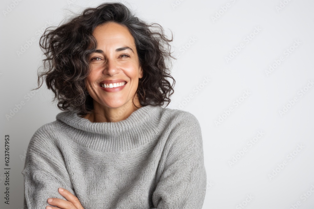 Portrait of a beautiful young woman smiling at the camera isolated on a white background Portrait of a beautiful young woman smiling at the camera isolated on a white background