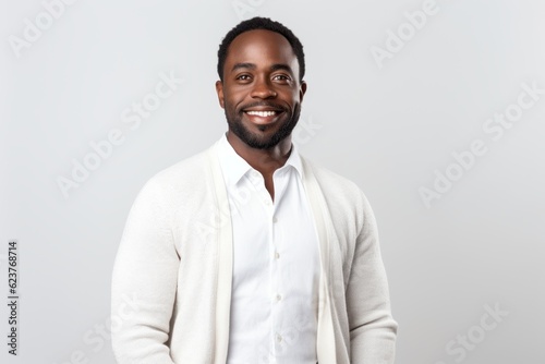 Portrait of handsome african american man smiling and looking at camera