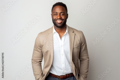 Portrait of handsome african american man smiling and looking at camera