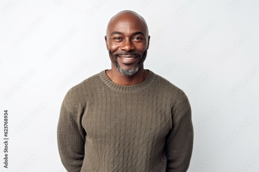 Portrait of a smiling african american man standing against white background Portrait of a smiling african american man standing against white background