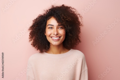 Portrait of a happy young african american woman looking at camera