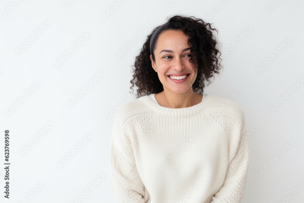 Portrait of a smiling young woman standing against white background with copy space Portrait of a smiling young woman standing against white background with copy space