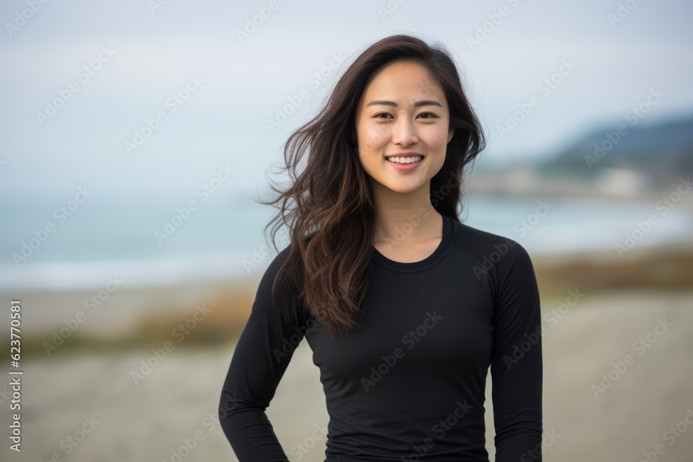 Portrait of beautiful young asian woman smiling on the beach. Portrait of beautiful young asian woman smiling on the beach.