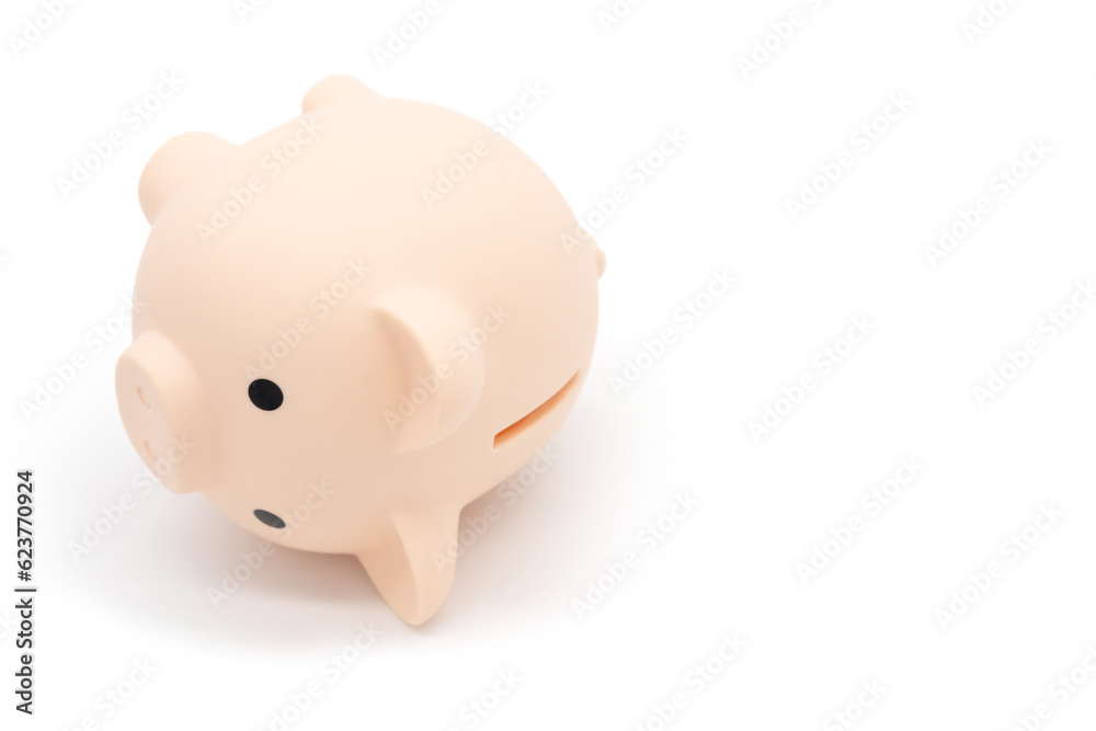 A falling piggy bank with no money in isolated on white background. bad feeling and crisis. Economic depression. Financial crisis, end of savings, bankruptcy. A falling piggy bank with no money in isolated on white background. bad feeling and crisis. Economic depression. Financial crisis, end of savings, bankruptcy.