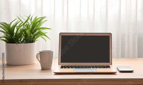 photo of a simple work desk with a laptop © imur