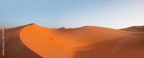 Beautiful sand dunes in the Sahara desert with amazing cloudy sky - Sahara, Morocco