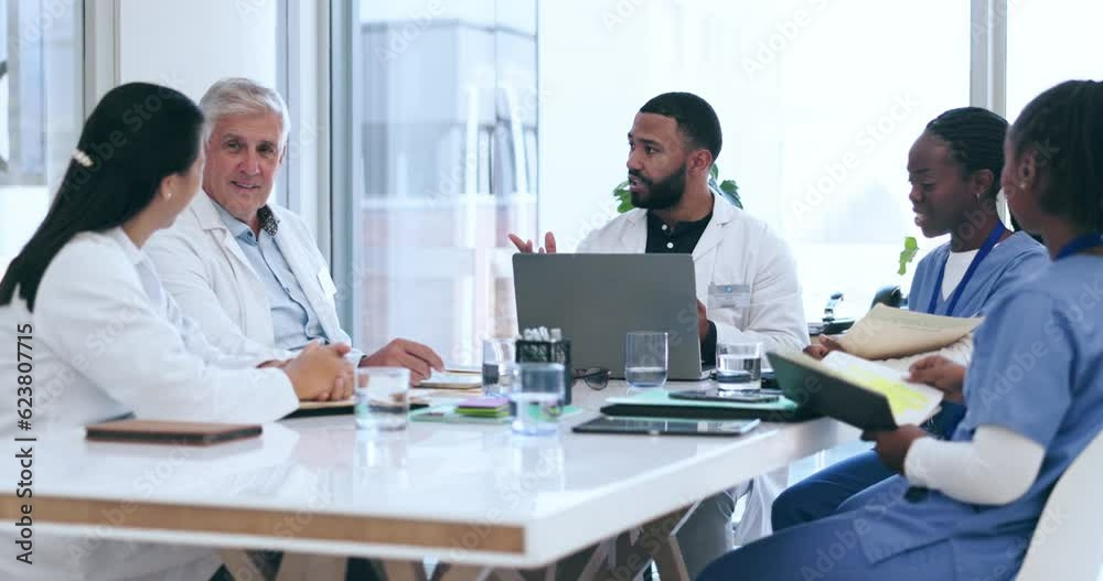 Group, meeting and doctors with a laptop, planning and discussion with innovation, surgery schedule and research. Staff, team and coworkers with a pc, data update and medical treatment in a hospital