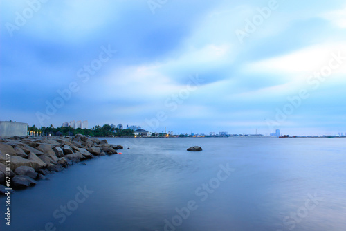 View of Ancol beach with cloudy overcast sky