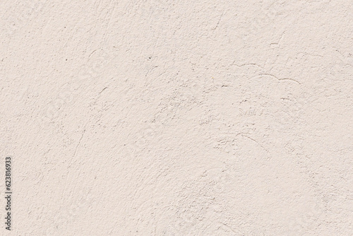 Leinwand Poster An old plaster cement wall, beige abstract background