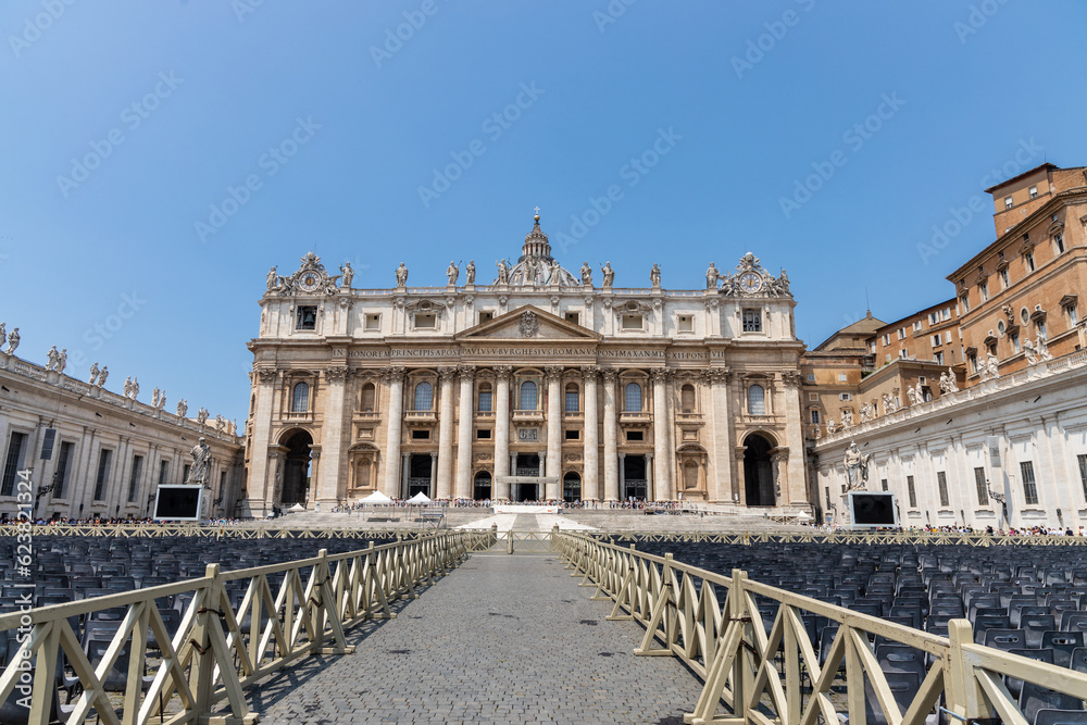 Saint Peter's Square is a large plaza located directly in front of St. Peter's Basilica in Vatican City. Chairs are prepared for mass and general audience.