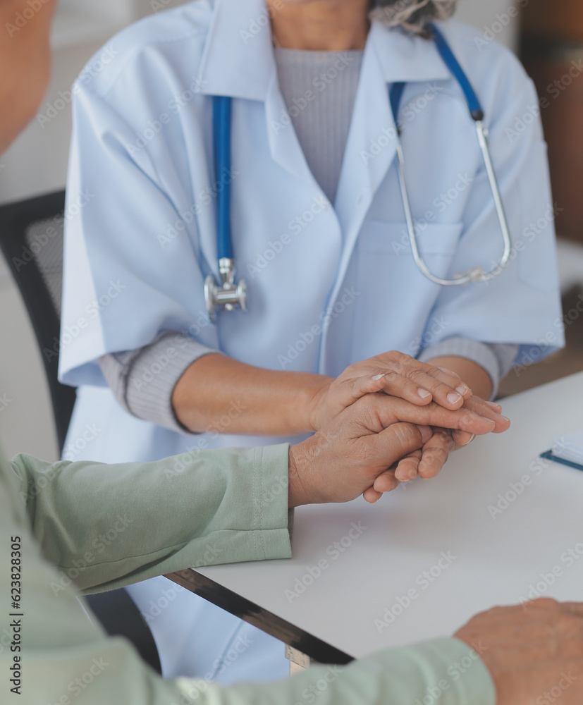 A health visitor with tablet explaining a senior woman how to take pills. A health visitor with tablet explaining a senior woman how to take pills.