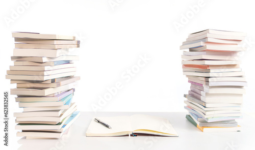 Textbooks stacked on the desktop photo