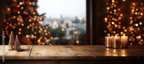 Wooden table with christmas tree and bokeh background.