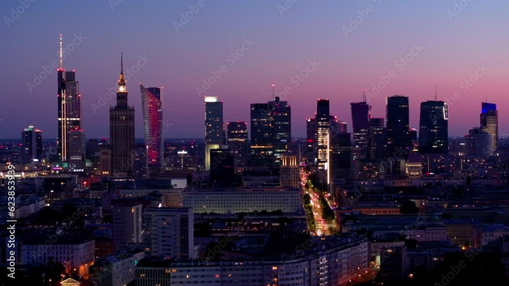 Aerial view of Warsaw Poland, at night. Warsaw business center at night: skyscrapers and Palace of Science and Culture. Drone footage of warsaw center at night. Aerial view of Warsaw Poland, at night. Warsaw business center at night: skyscrapers and Palace of Science and Culture. Drone footage of warsaw center at night.