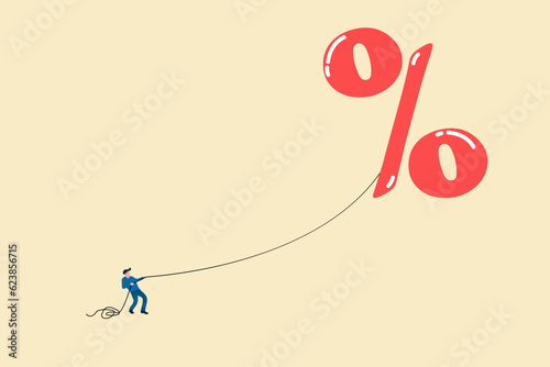 Businessman pull inflation interest rate balloon. concept of rising interest rates stop and Inflation increases